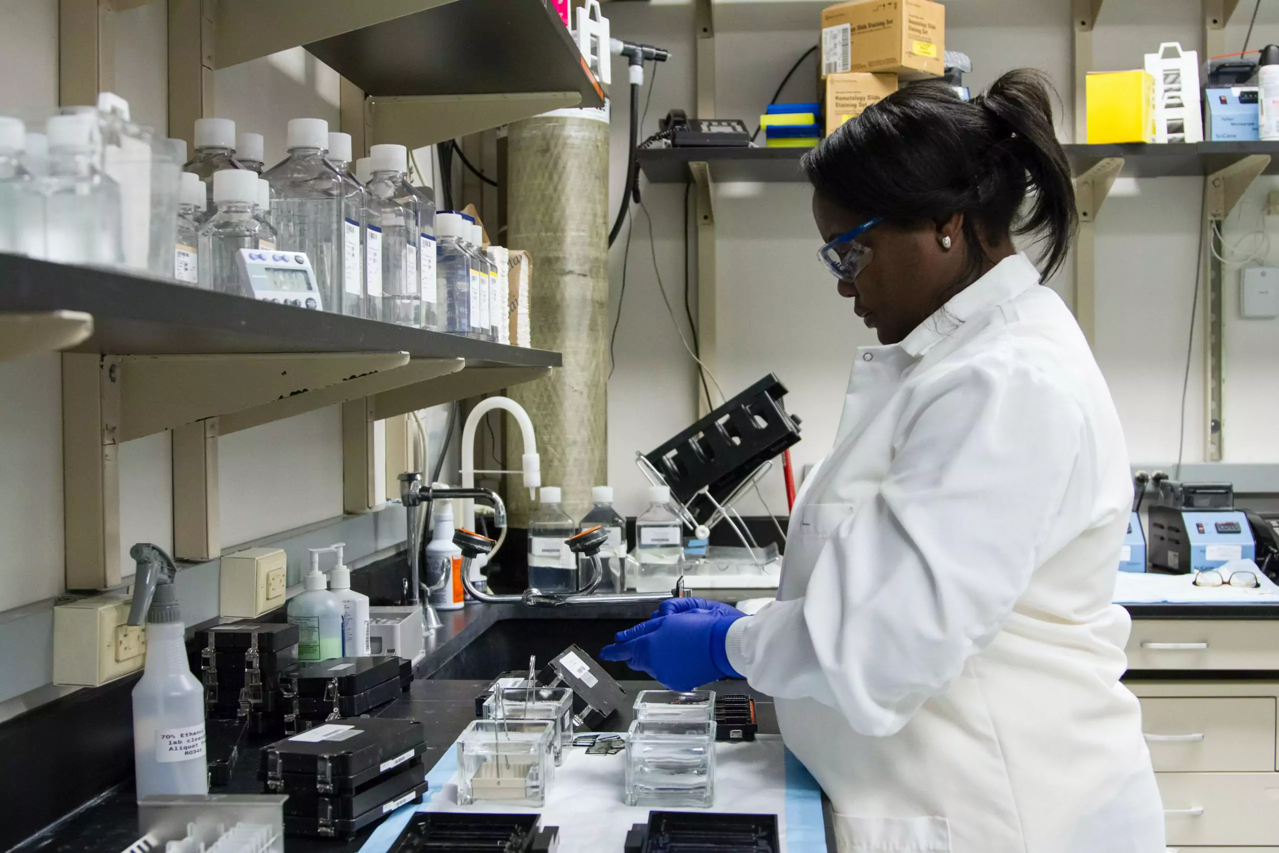 Black female scientist in lab doing fibroids research